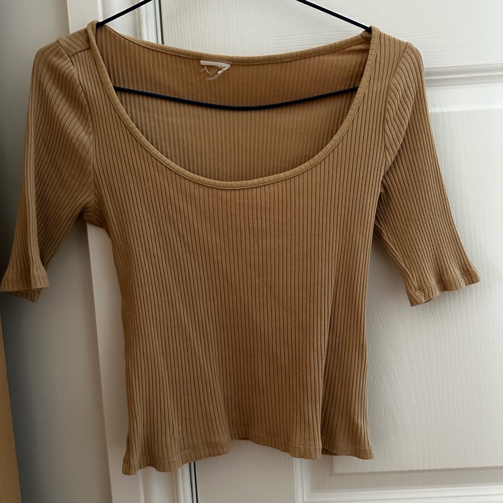 Beige half sleeve top. Only work a few times. Great condition.